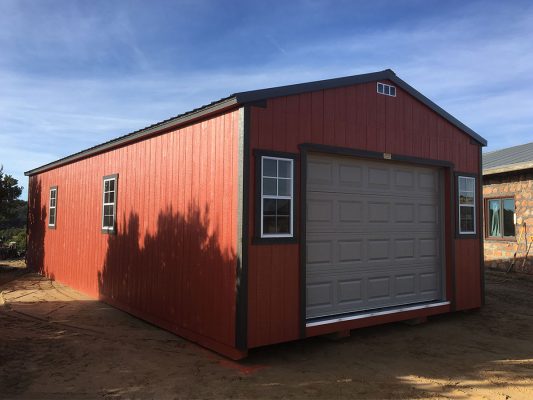 Ranch shed with roll-up garage door