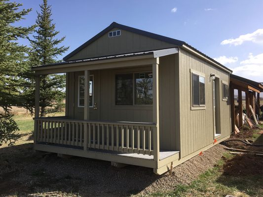 ranch shed office with front porch, two man doors, metal roof
